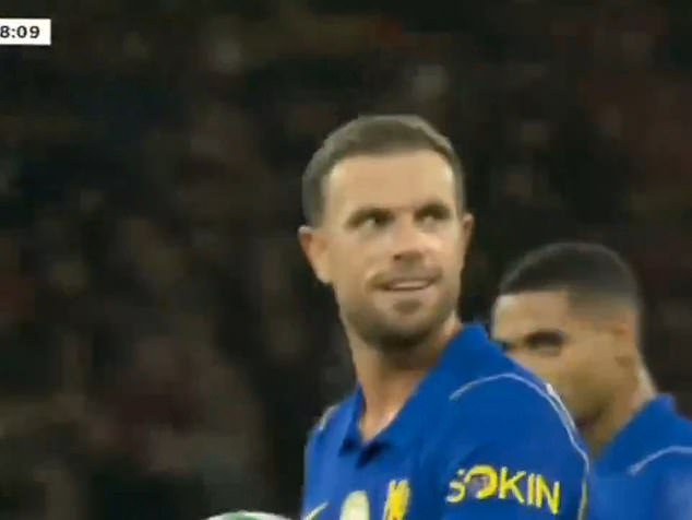 Jordan Henderson was seen smirking after receiving a hostile reception from Liverpool fans