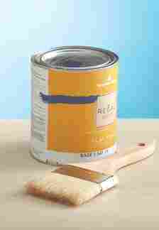 A paint can marked with paint to show how much liquid is left