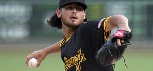 Pirates place hard-throwing rookie pitcher Jared Jones on the injured list with a right lat strain