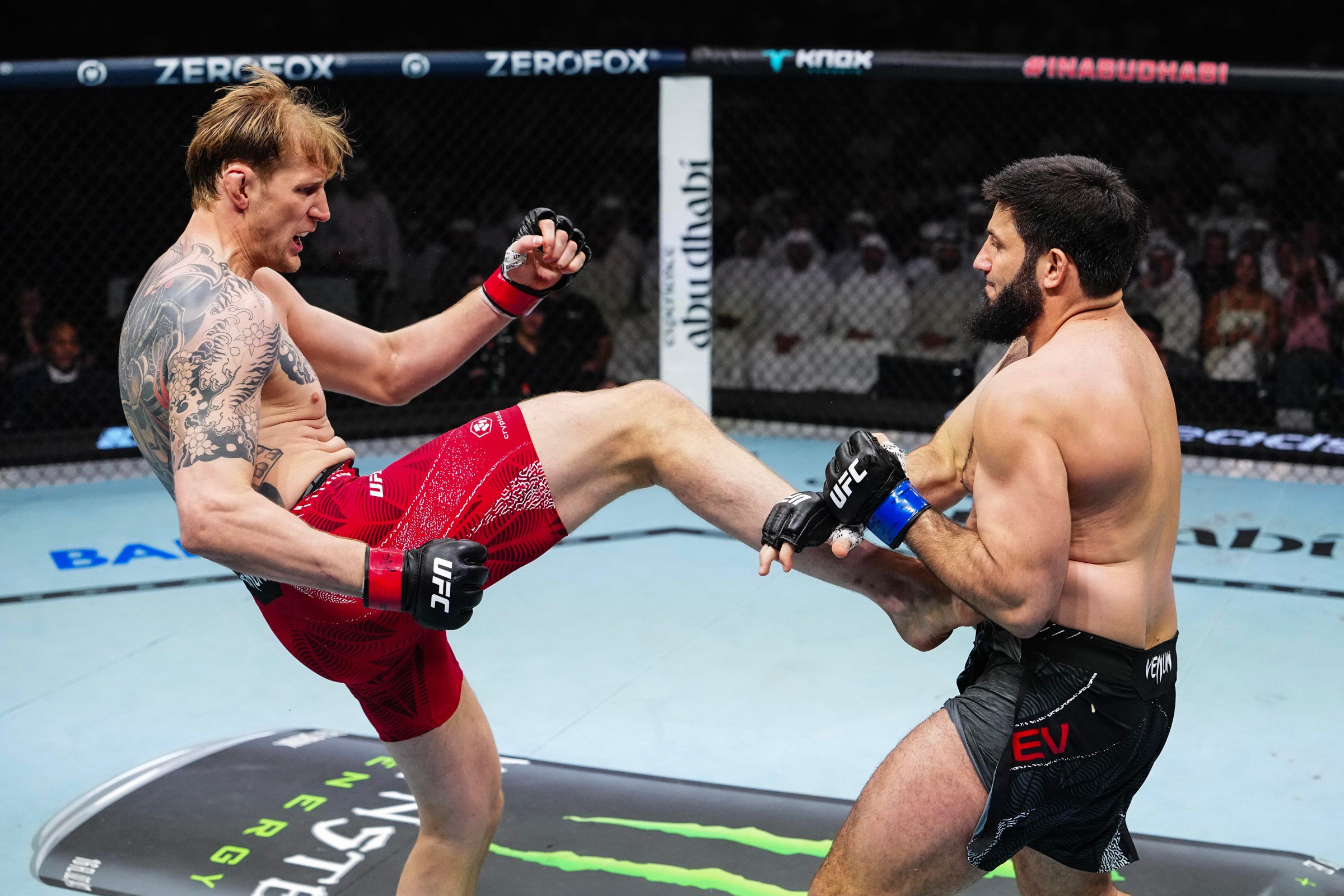 ABU DHABI, UNITED ARAB EMIRATES - OCTOBER 24: Alexander Volkov of Russia kicks Rizvan Kuniev of Russia in a heavyweight fight during the UFC 333 event at Etihad Arena on October 24, 2026 in Abu Dhabi, United Arab Emirates. (Photo by Jeff Bottari/Zuffa LLC)