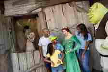 Guests at Universal Orlando's DreamWorks Land meet Shrek and Donkey.