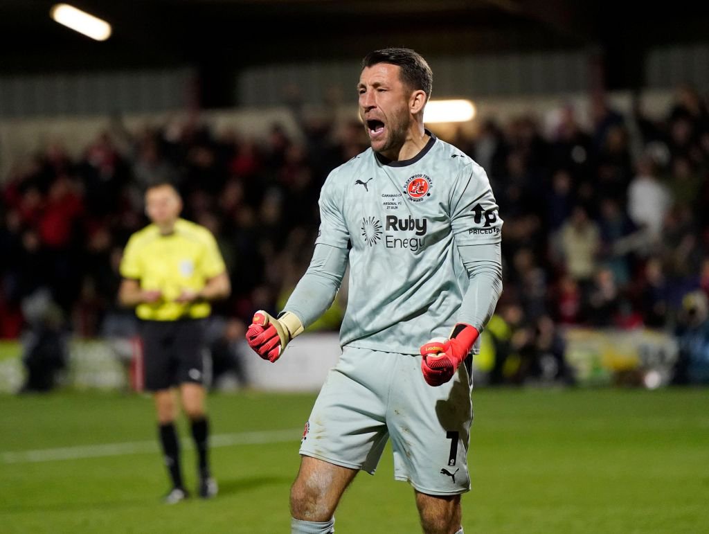 Fleetwood, England, 27th October 2026. Jay Lynch of Fleetwood Town celebrates having the penalty of Bruno Guimaraes of Arsenal during the Fleetwood Town vs Arsenal Carabao Cup match at Highbury Stadium, Fleetwood. Picture credit should read: Andre