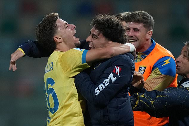 Frosinone's Matteo Cichella, left, celebrates with teammates after scoring a goal during the Serie A EniLive soccer match between Frosinone and Lecce Thursday, Oct. 29, 2026, in Frosinone, Italy. (Alfredo Falcone//LaPresse via AP)