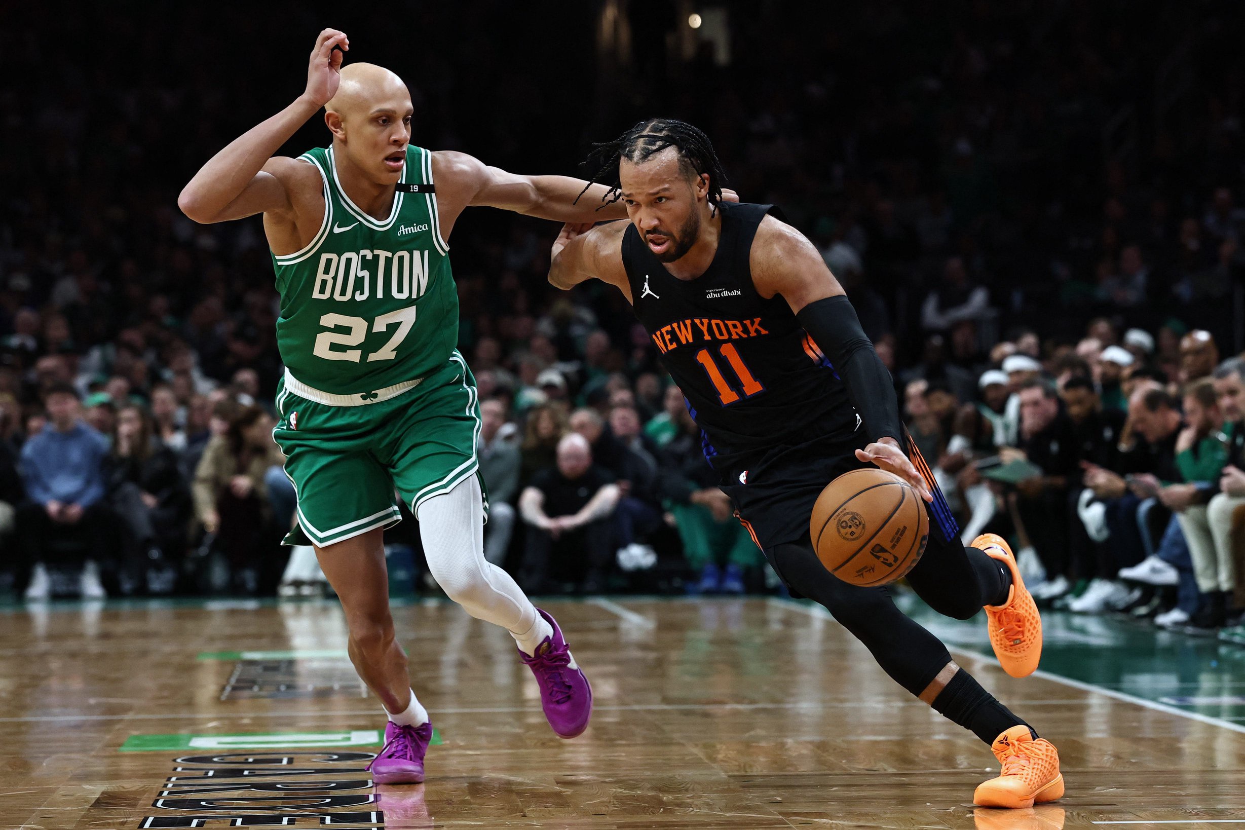 Oct 23, 2026; Boston, Massachusetts, USA; New York Knicks guard Jalen Brunson (11) drives by Boston Celtics guard Jordan Walsh (27) during the second quarter at TD Garden. Mandatory Credit: Winslow Townson-Imagn Images