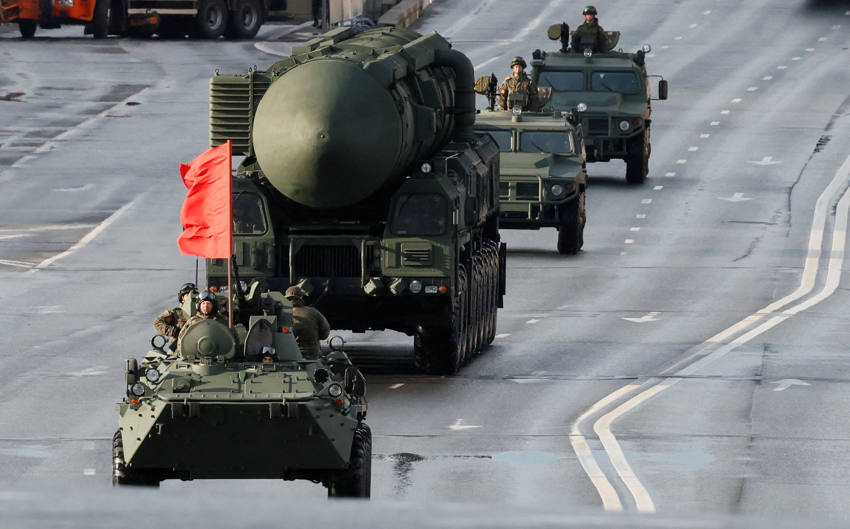 Russia's Yars intercontinental ballistic missile systems are dragged through the streets of Moscow this morning