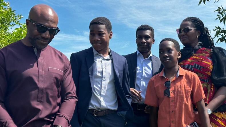 Emeka Nnadi (left) was surrounded by family throughout the ceremony Saturday morning. [Photo Credit: Joanne Roberts, CityNews]