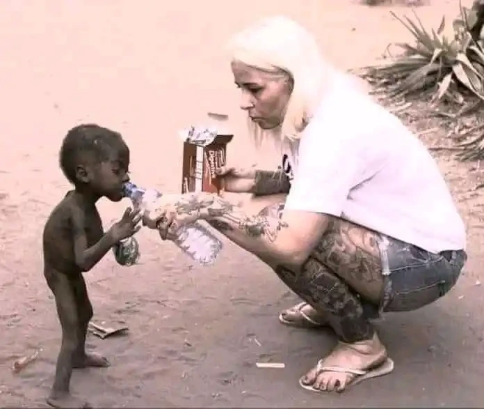 Remember the starving boy who was rescued by a White Woman? - See his current looks