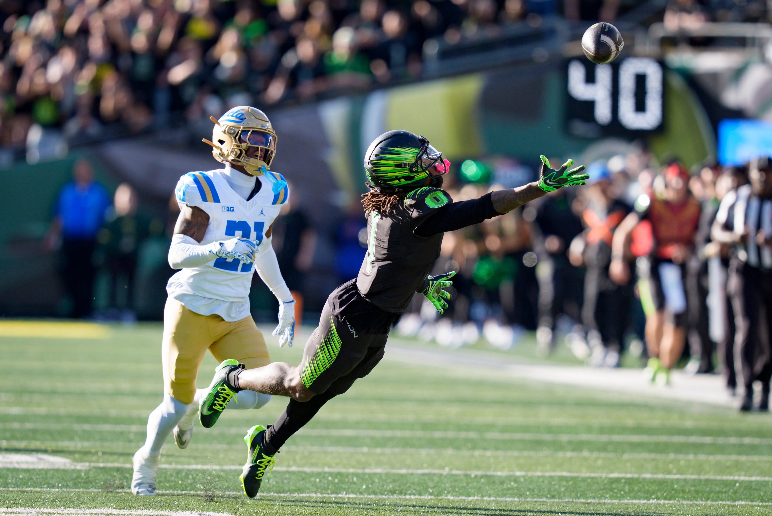 A pass falls just out of reach of Oregon wide receiver Dakorien Moore as the Oregon Ducks host the UCLA Bruins on Oct. 10, 2026, at Autzen Stadium in Eugene, Oregon.