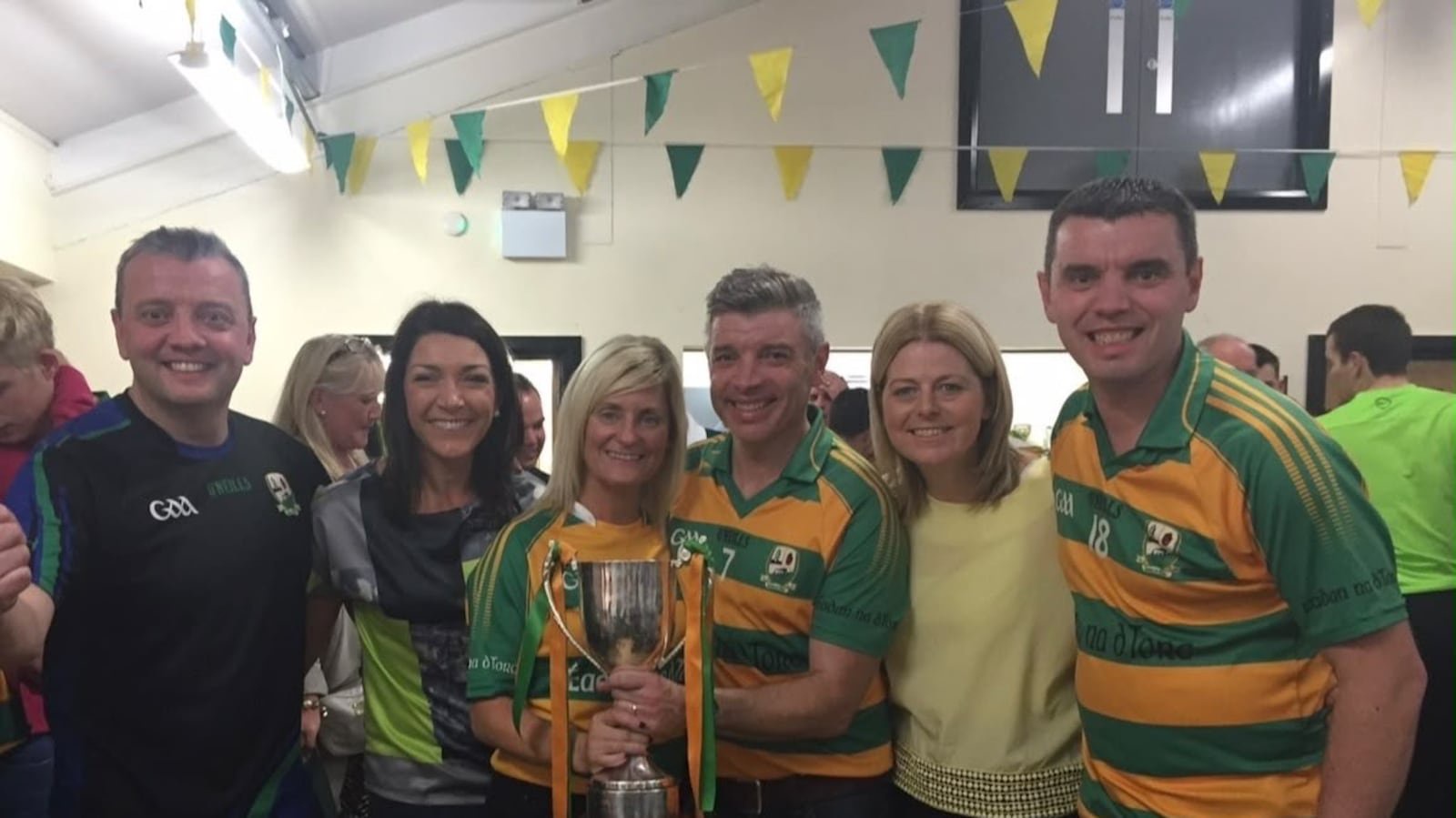 Happy days in Edendork. Veronica and Declan (centre) celebrates success for the St Malachy's club