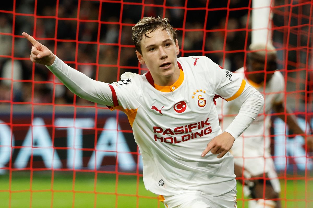 Aleksey Batrakov celebrates scoring against Lille
