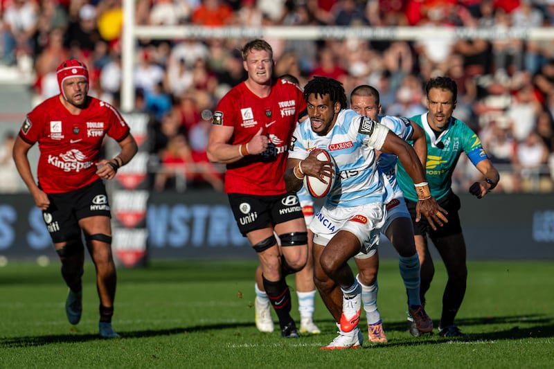 Racing's Selestino Ravutaumada runs with the ball during the Top 14 rugby union match against Toulon on Saturday. Photograph: Miguel Medina/Getty