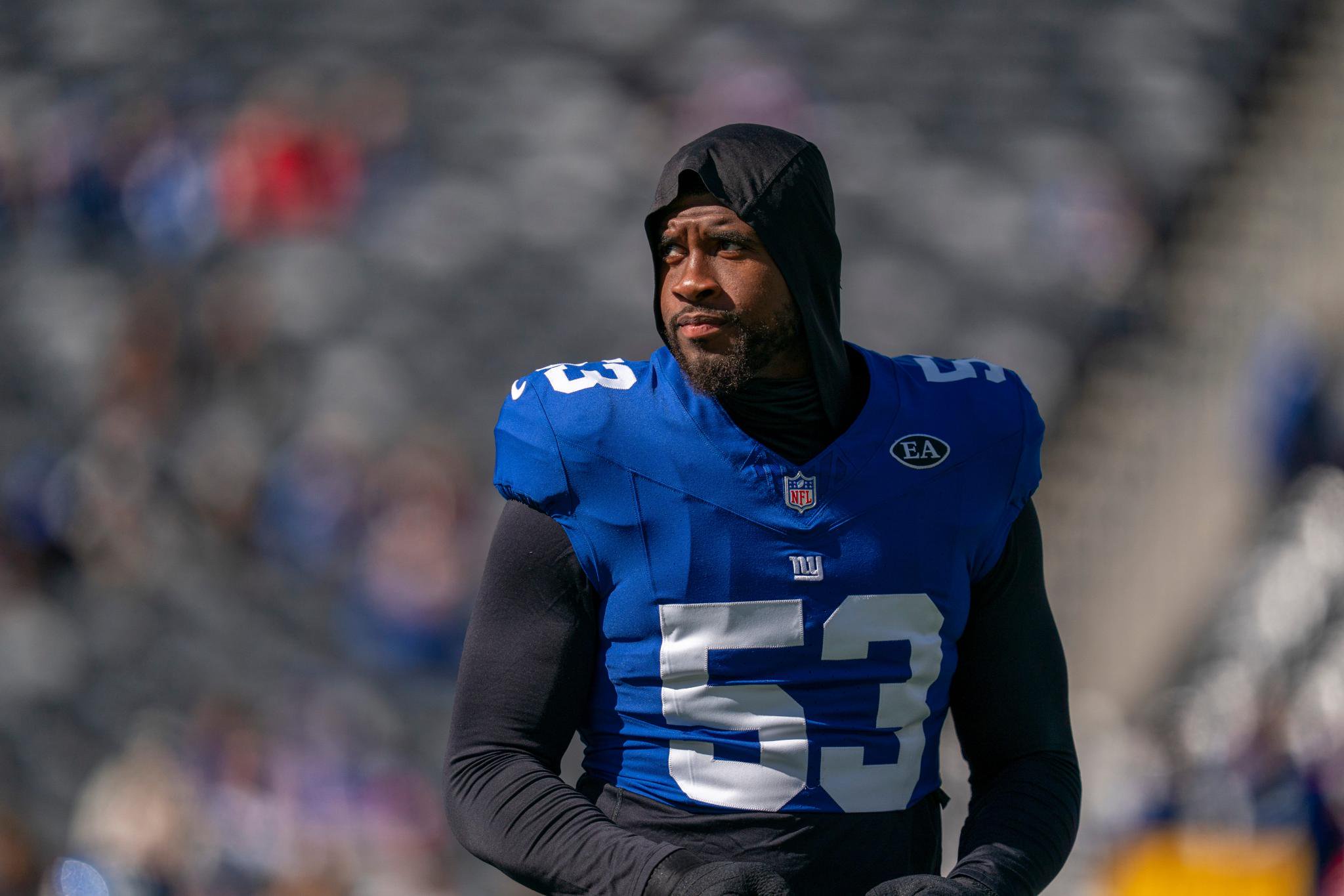 New York Giants linebacker Jihad Ward (53) warms up on the field.
