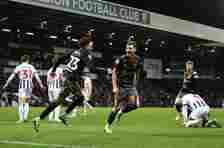 David Brooks of Southampton celebrates scoring his team's second goal with teammate Samuel Edozie  during the Sky Bet Championship match between We...