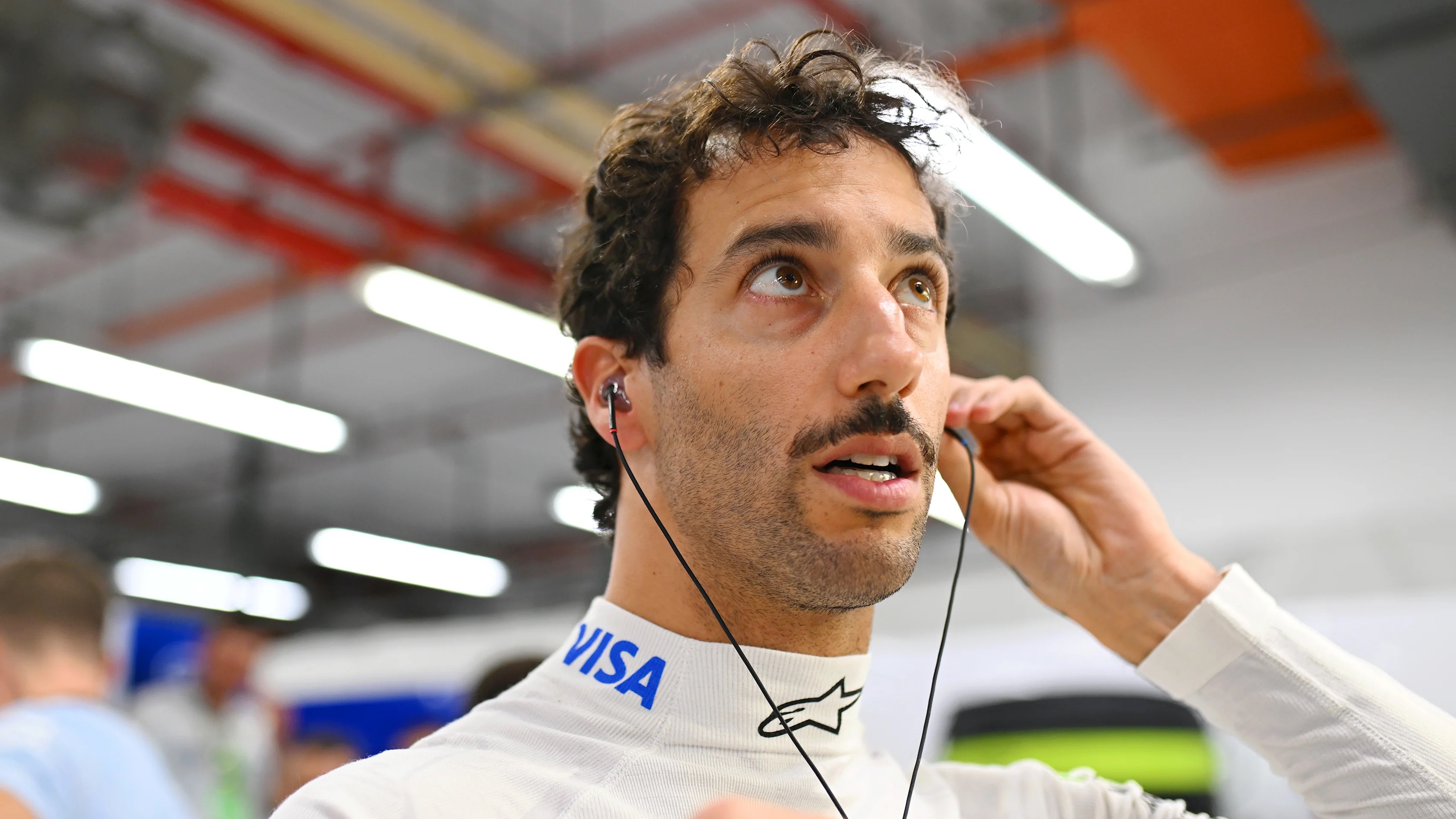 SINGAPORE, SINGAPORE - SEPTEMBER 22: Daniel Ricciardo of Australia and Visa Cash App RB prepares in