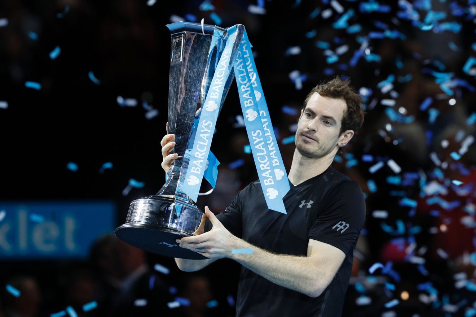 Andy Murray celebrates with the trophy after winning the ATP Finals in 2016.