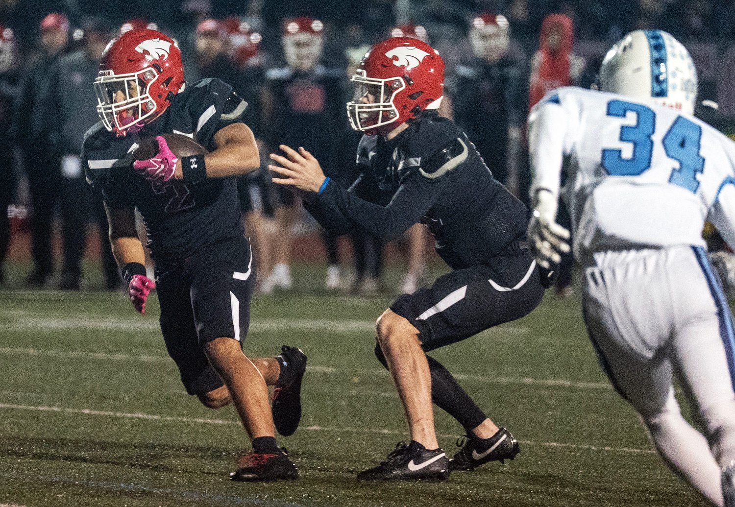 Milton senior Jayden Dubios runs against Franklin at Brooks Field in Milton, Oct. 23, 2026.