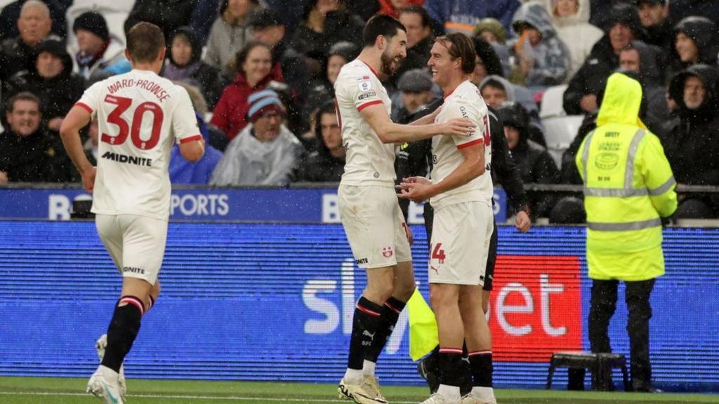 Southampton players celebrate with goalscorer James Bree