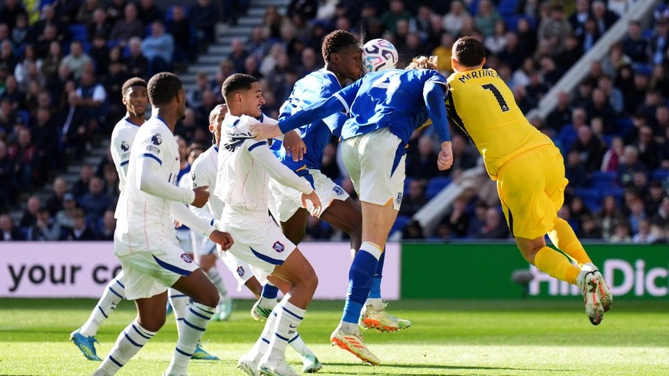 Chelsea goalkeeper Emiliano Martinez, right, picks up an injury during the English Premier League soccer match between Everton and Chelsea. (Mike Egerton/PA via AP)