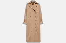 One of the best winter coats to shop in 2024, the Toteme Signature Cotton-Blend Trench Coat