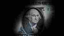 FILE - The likeness of George Washington is seen on a U.S. one dollar bill, March 13, 2023, in Marple Township, Pa. (AP Photo/Matt Slocum, File)