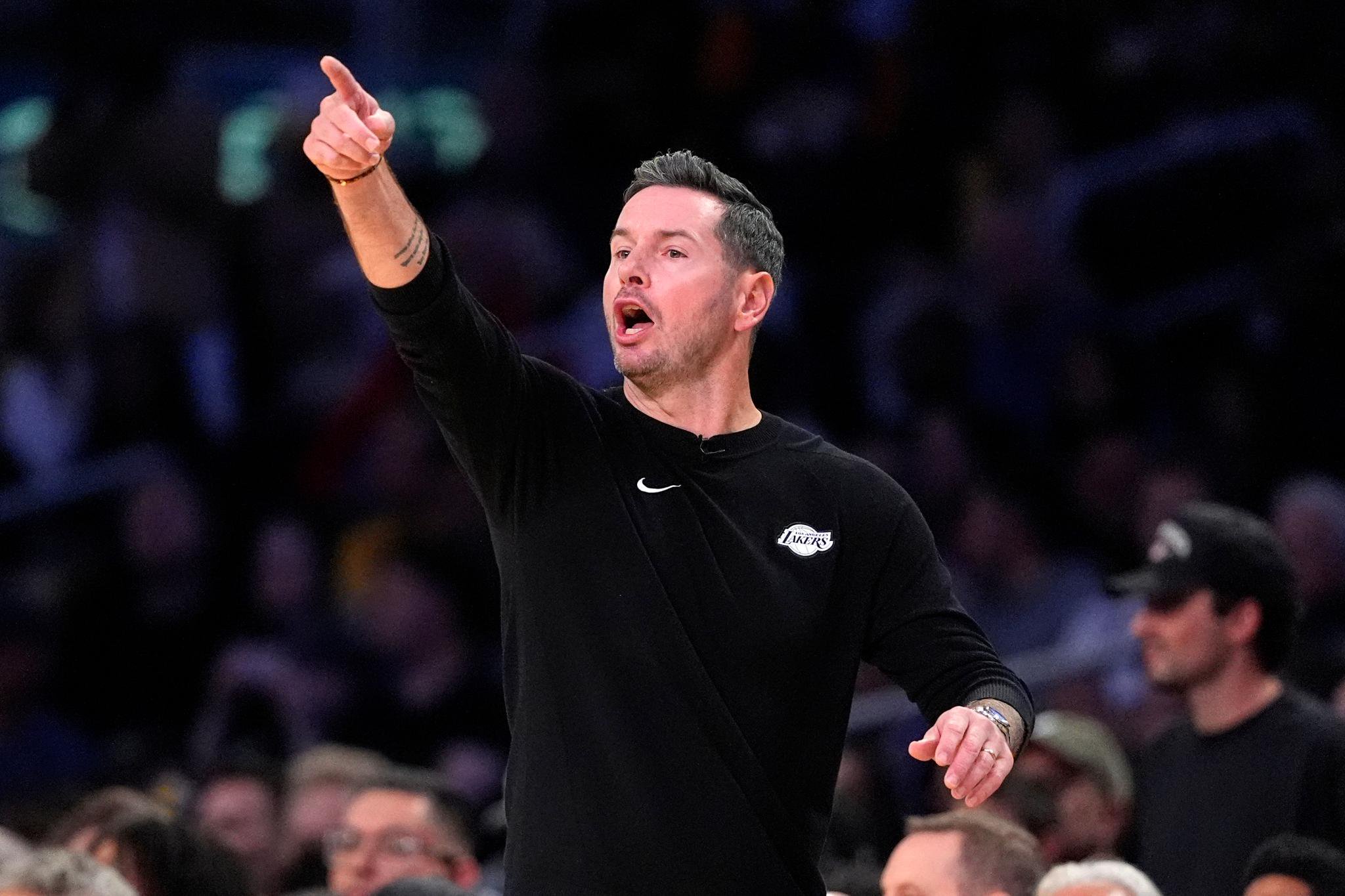 Los Angeles Lakers head coach JJ Redick gestures during a game against the Golden State Warriors.