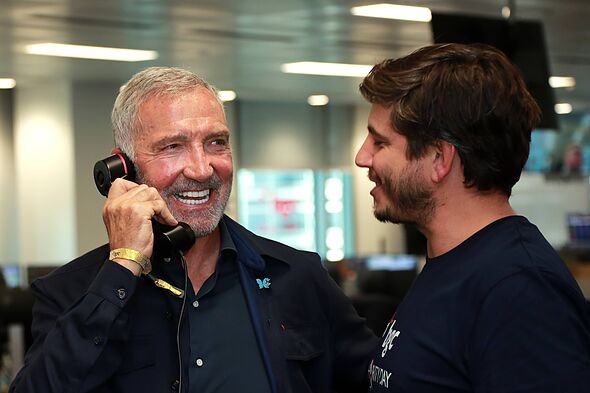 Graeme Souness holding a corded phone to his ear