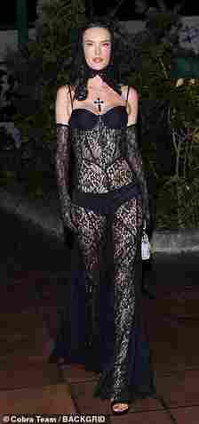 Elsewhere, Alessandra, 43, looked sensational in a racy lace gown, with a built in black bra and matching bottoms