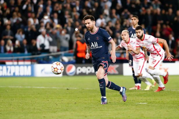 Lionel Messi #30 of Paris Saint-Germain shoots a penalty and scores during the UEFA Champions League group A match between Paris Saint-Germain and RB Leipzig at Parc des Princes on October 19, 2021 in Paris, France.