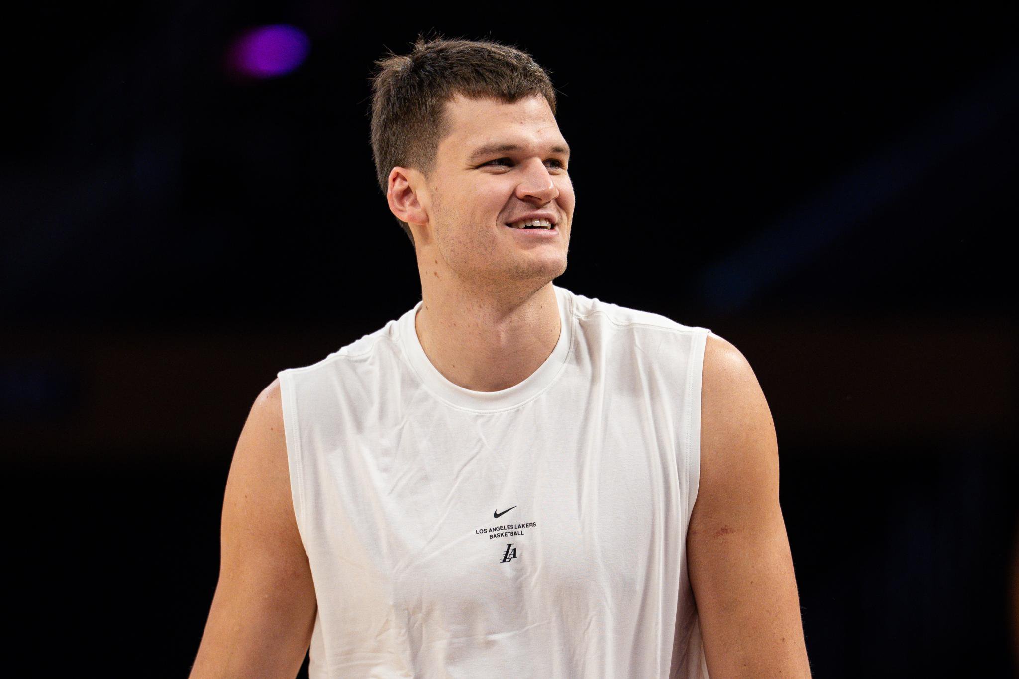 Los Angeles Lakers center Walker Kessler (14) warms up before a game against the Denver Nuggets at Crypto.com Arena in Los Angeles, Friday, Oct. 16, 2026.