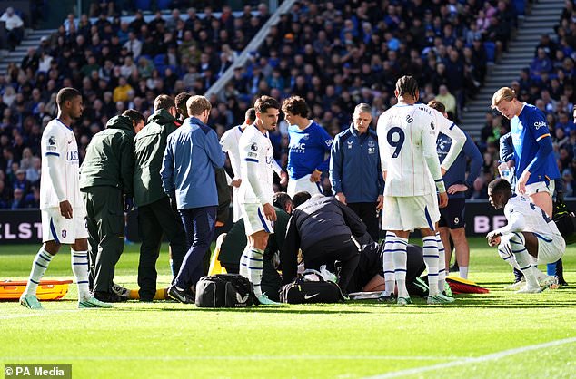 Chelsea goalkeeper Emiliano Martinez received treatment after a head clash at Everton (Mike Egerton/PA)
