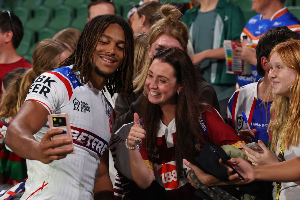 England's Dom Young poses with fans