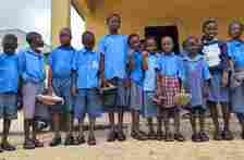  Young Nigerians provide footwears, books for indigent students in Bayelsa