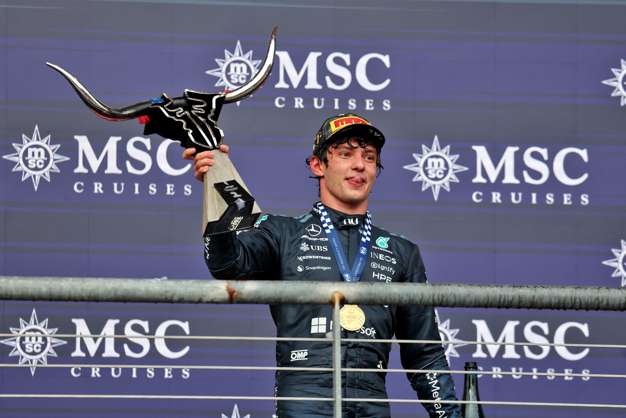 Race winner Andrea Kimi Antonelli (ITA) Mercedes AMG Formula One Team celebrates on the podium.