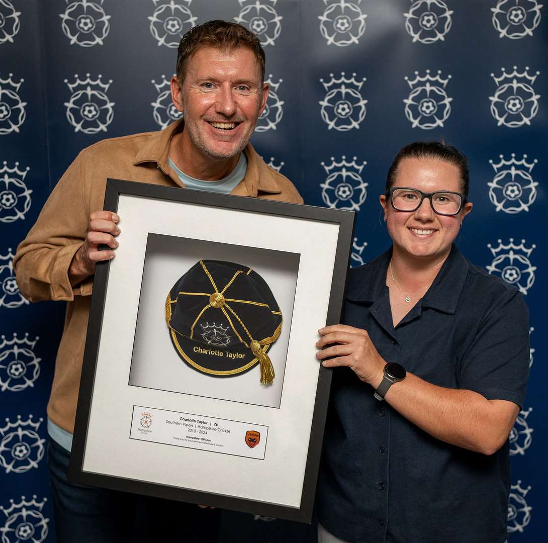 Charlotte Taylor (right) receives her 100th cap award from Hampshire Cricket’s Adam Carty
