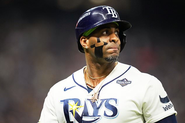 Tampa Bay Rays' Yandy Díaz reacts after making an out during the eighth inning of Game 5 of baseball's World Series, Wednesday, Oct. 28, 2026, in St. Petersburg, Fla., between the Milwaukee Brewers and the Tampa Bay Rays. (AP Photo/Ashley Landis)