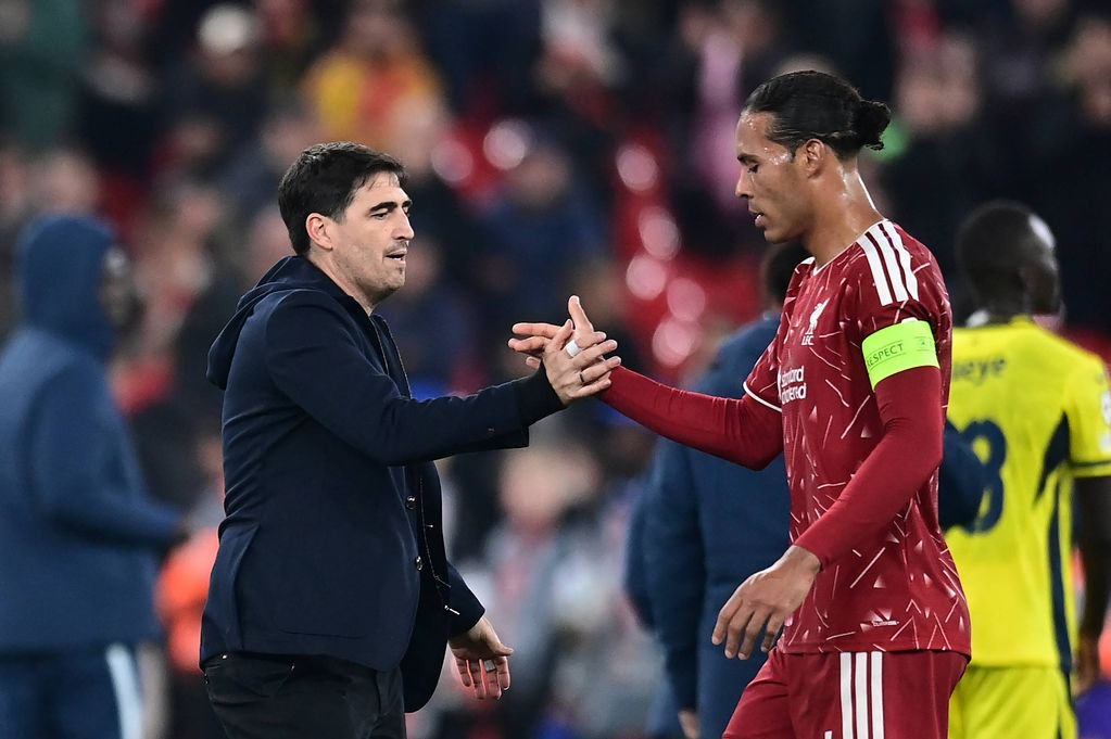 Liverpool head coach Andoni Iraola with captain Virgil van Dijk after the UEFA Champions League match against Villarreal CF at Anfield on October 20 2026