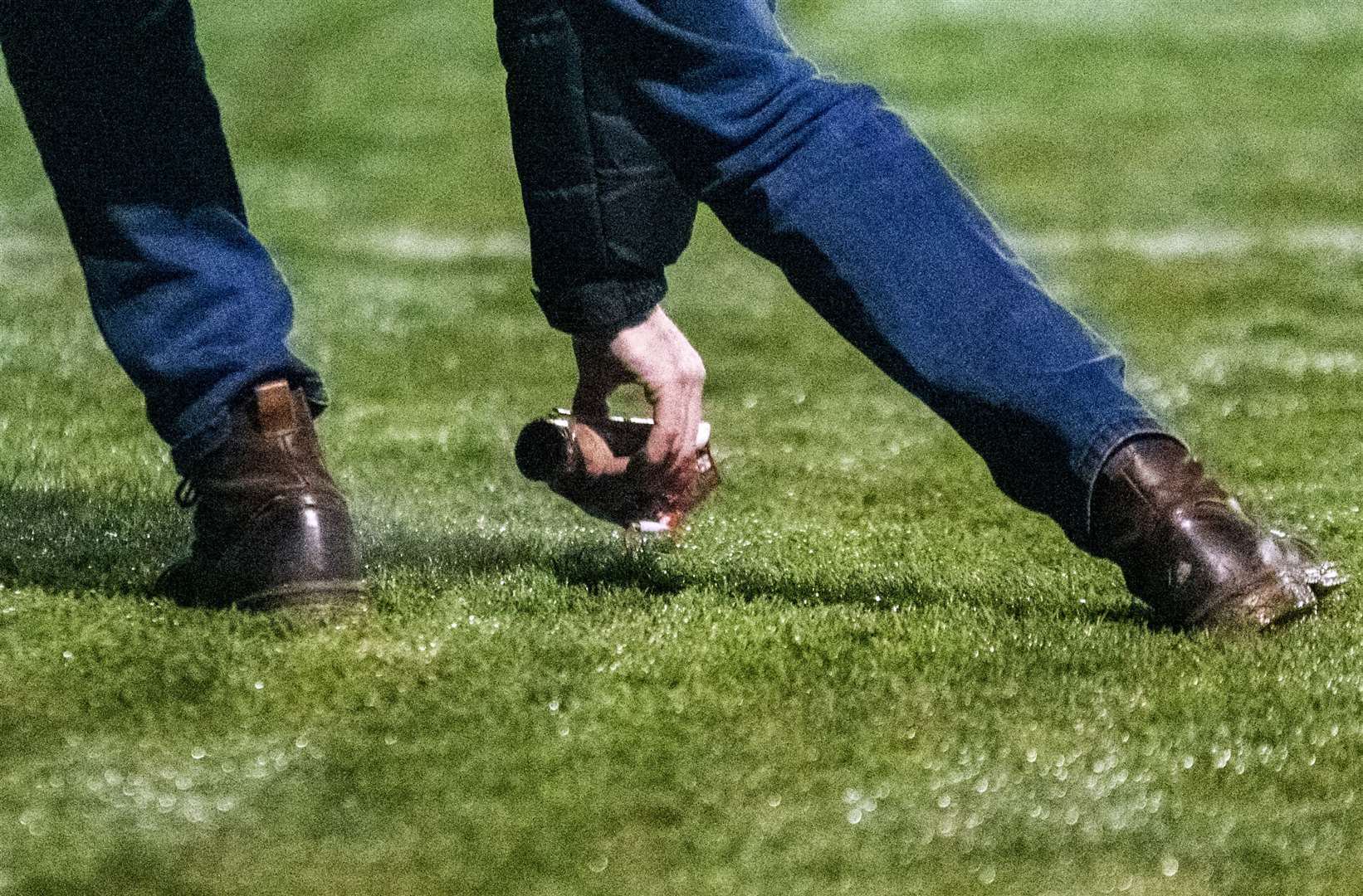 Smoke canisters on the pitch. Picture: Daniel Forsyth.
