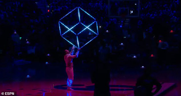 Known as 'Light Man,' the performer wore an LED costume while balancing glowing objects on his hands as a small array of luminous drones floated around him. Fans were not impressed