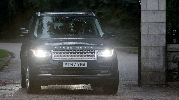 A Range Rover carrying Prince Harry, Duke of Sussex leaves Balmoral