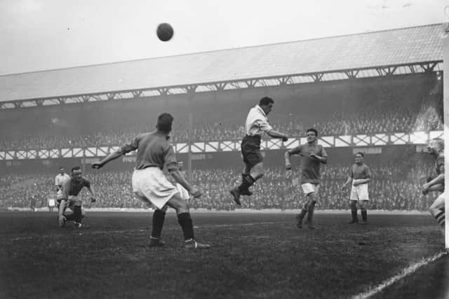 The legendary Dixie Dean in action for England. Photo by Edward G. Malindine/Topical Press Agency/Getty Images