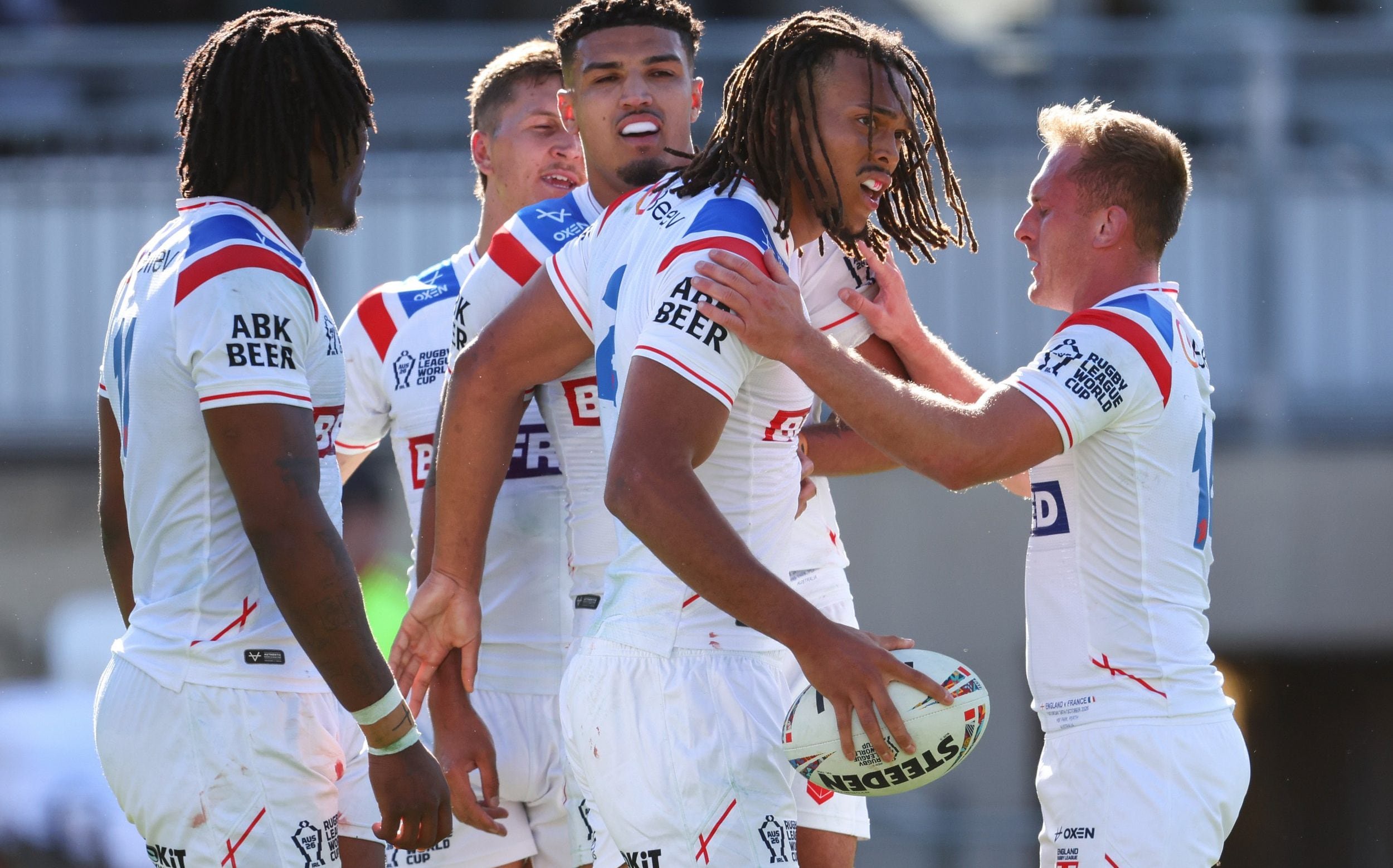 Dom Young scored three of England's 14 tries in their thrashing of France in Perth, Australia