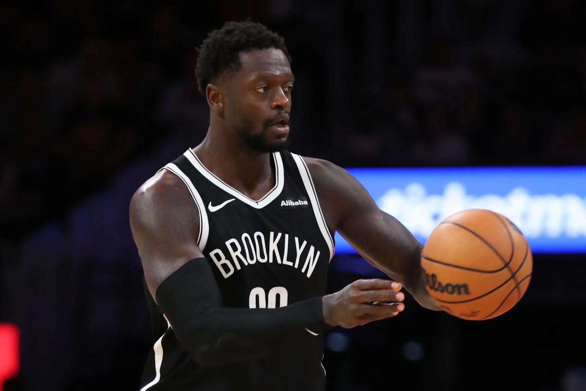 Julius Randle of the Brooklyn Nets holding a basketball during a game against the Miami Heat