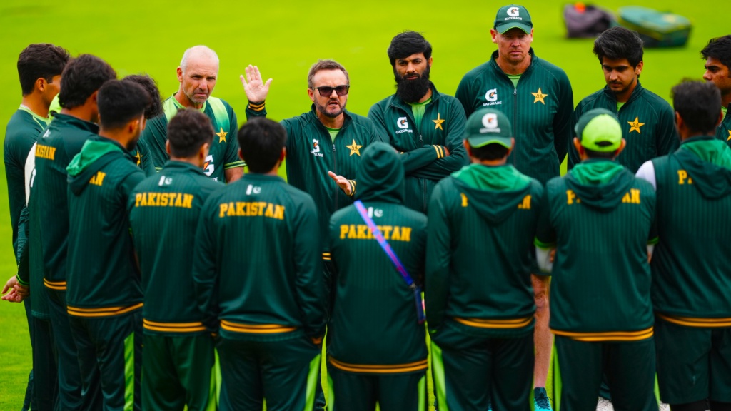 Pakistan's head coach Mike Hesson, center, raises a hand while speaking to the team during a cricket nets session in Birmingham, England, Tuesday, Sept. 8, 2026. (Nick Potts/PA via AP)