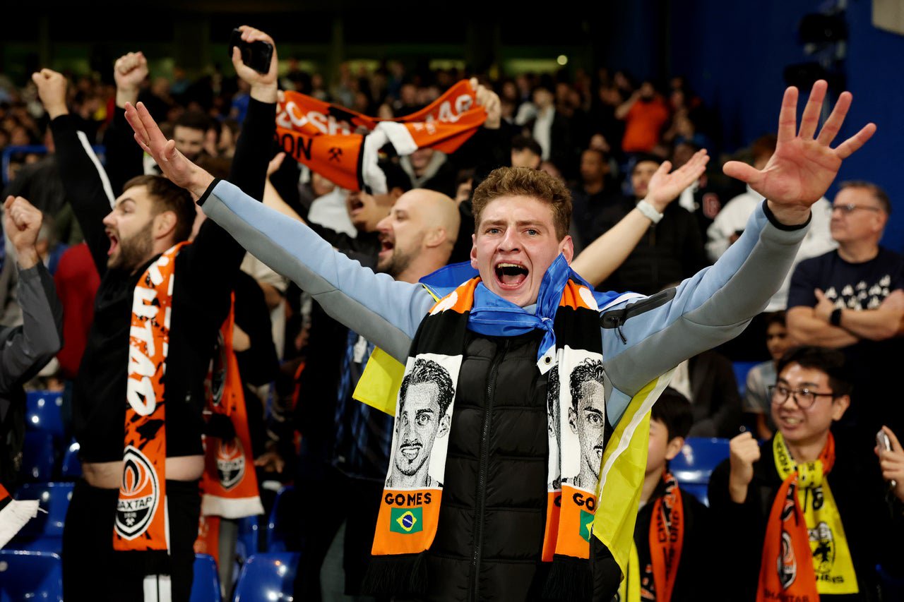 Shakhtar fans celebrate their victory against AEK Athens at Stamford Bridge (Getty)