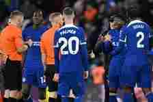 Referee Craig Pawson is confronted by Noni Madueke of Chelsea after the Premier League match between Aston Villa and Chelsea FC at Villa Park on Ap...