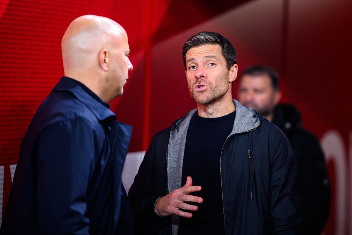 LIVERPOOL, ENGLAND - NOVEMBER 5: (L-R) Arne Slot of Liverpool and headcoach Xabi Alonso of Leverkusen  after the UEFA Champions League 2024/25 League Phase MD4 match between Liverpool FC and Bayer 04 Leverkusen at Anfield on November 5, 2024 in Liverpool, United Kingdom. (Photo by Jörg Schüler/Bayer 04 Leverkusen via Getty Images)