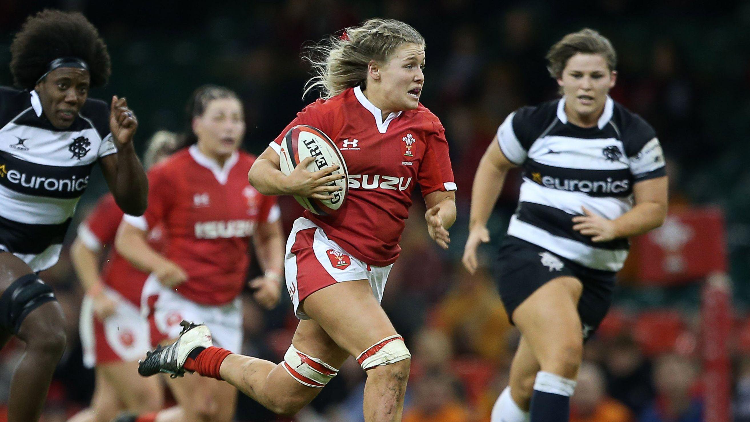 Alex Callender runs away to score for Wales against the Barbarians
