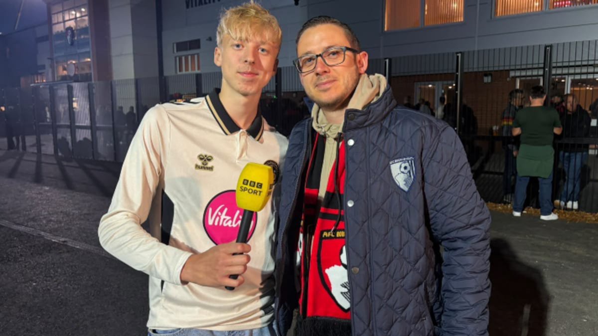 Bournemouth fan Kirk Tovey with his son Owen outside Vitality Stadium