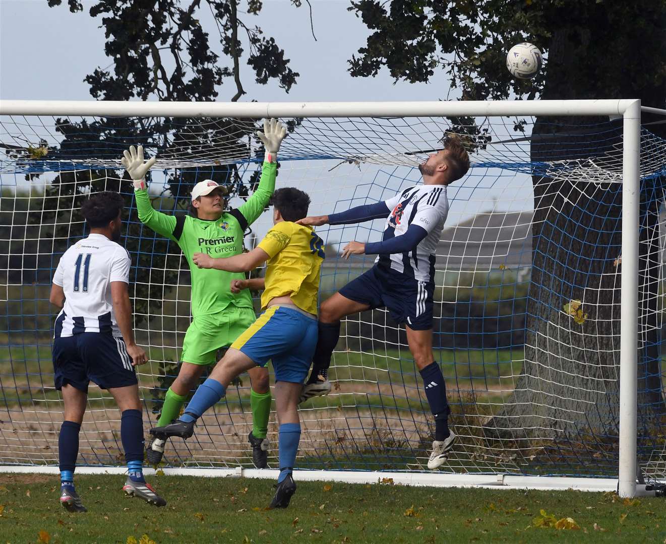 Action from Moulton Harrox's home defeat to Sawtry. Photo: Chris Lowndes