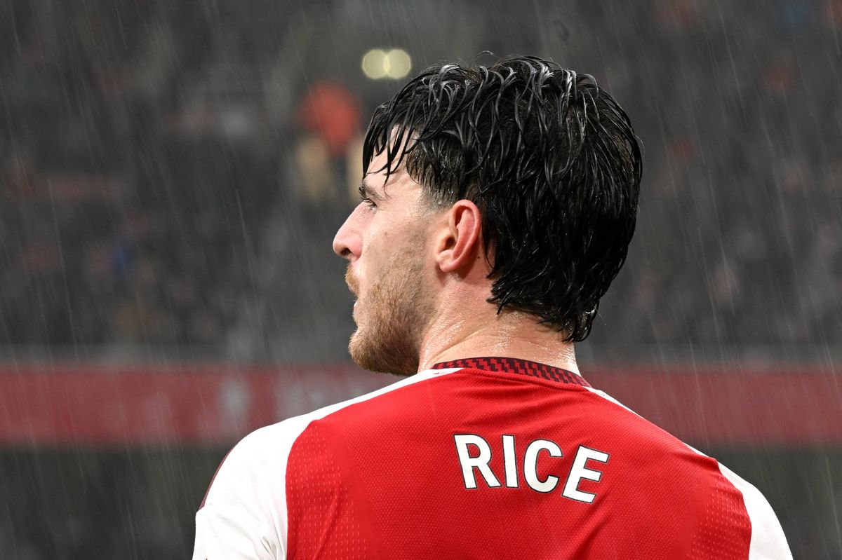Declan Rice looks as rain pours